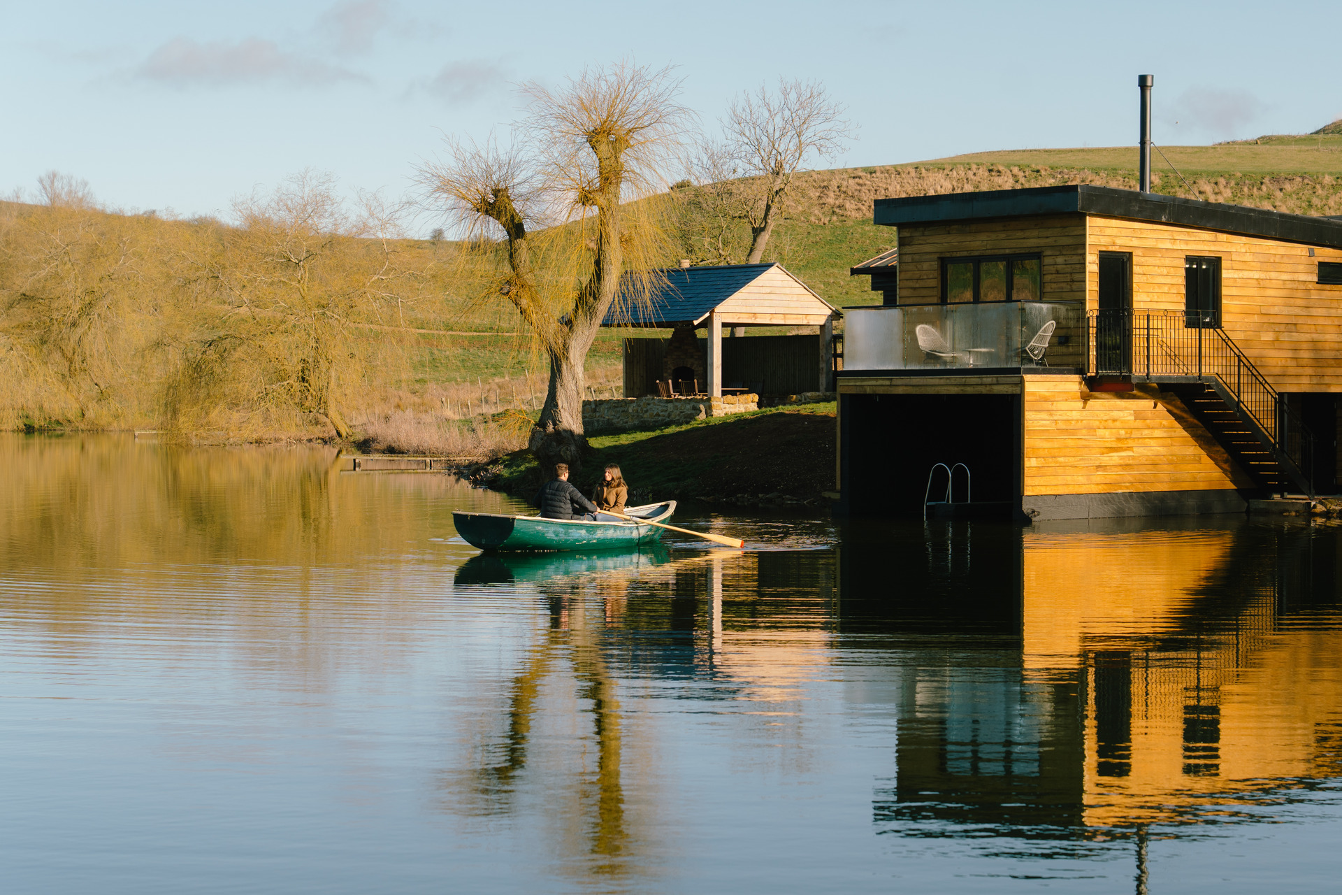 couple launching from Otby Boathouse