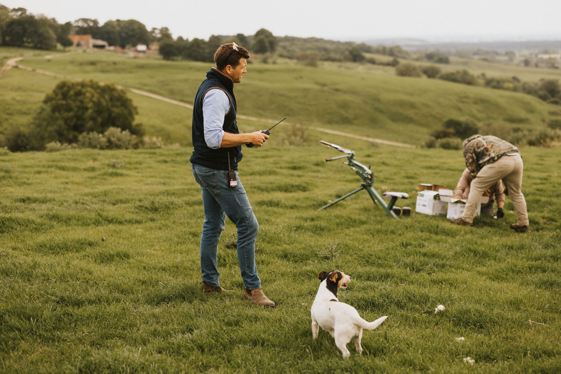 Frank standing with the dog waiting to loose a clay pigeon