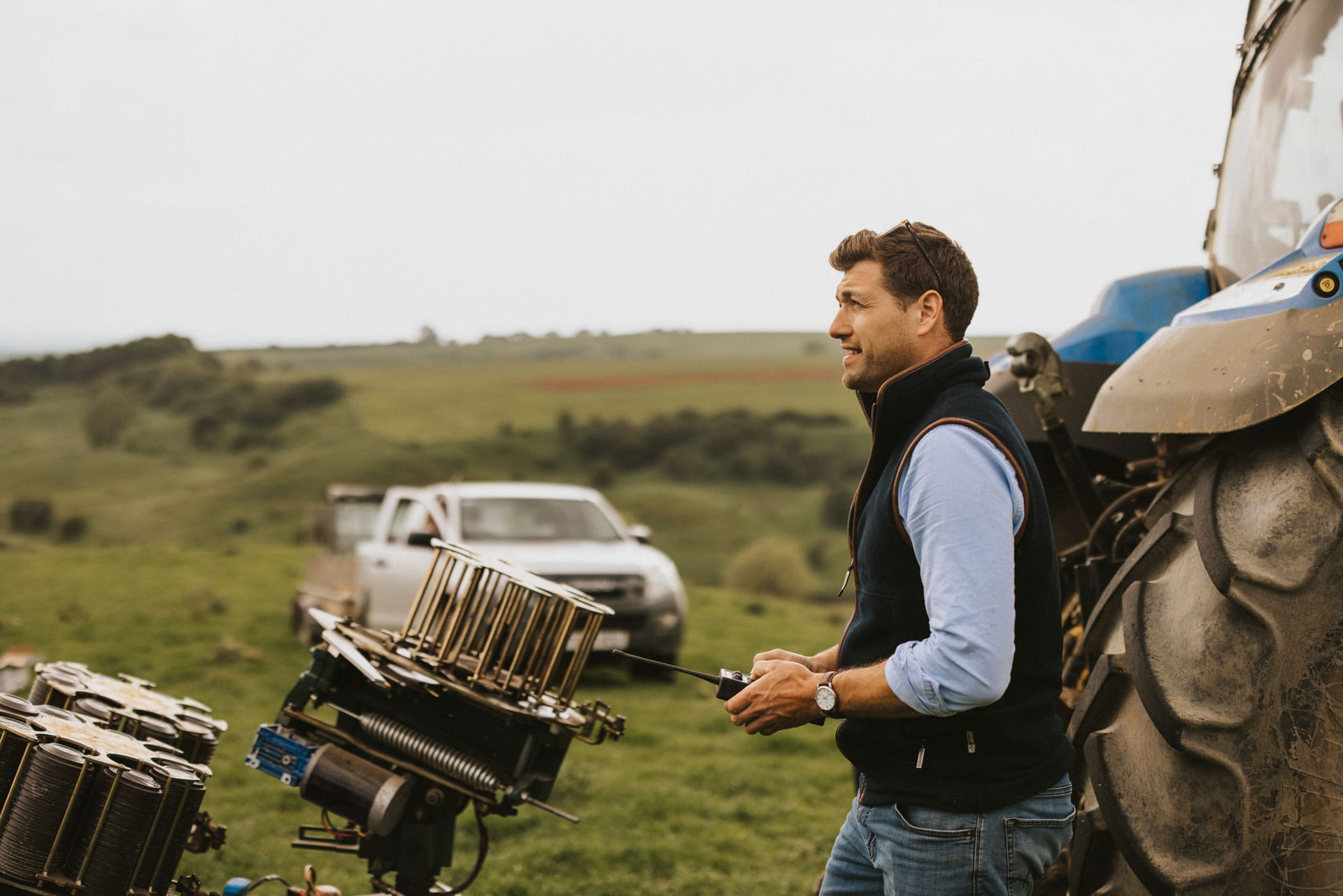 Frank holding the automatic clay trap controller preparing for use