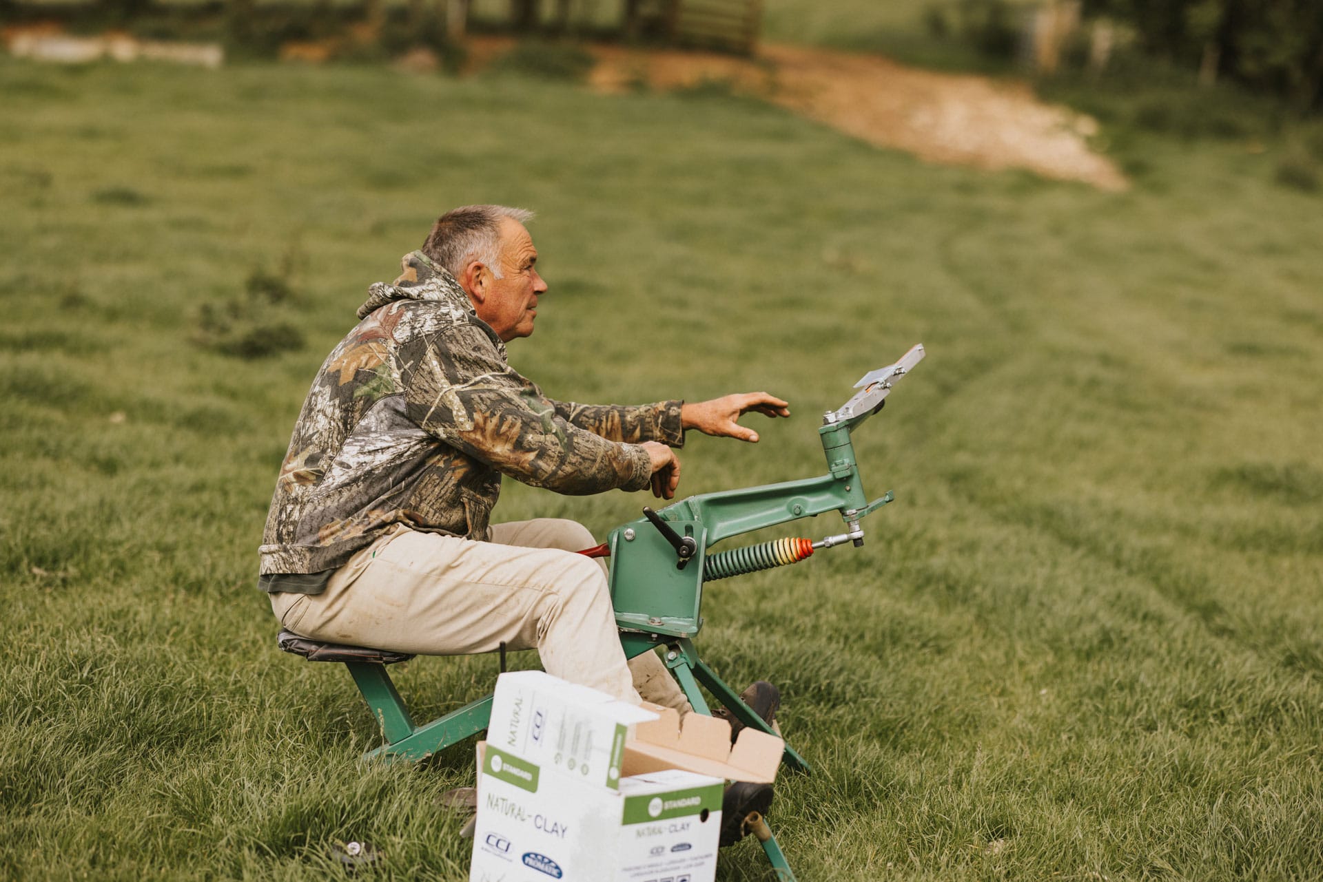 Manual clay trap being operated by a man