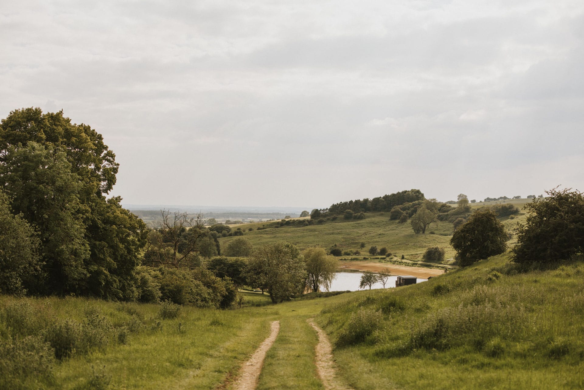 Track leading down to the Otby Boat House and the Otby Lake