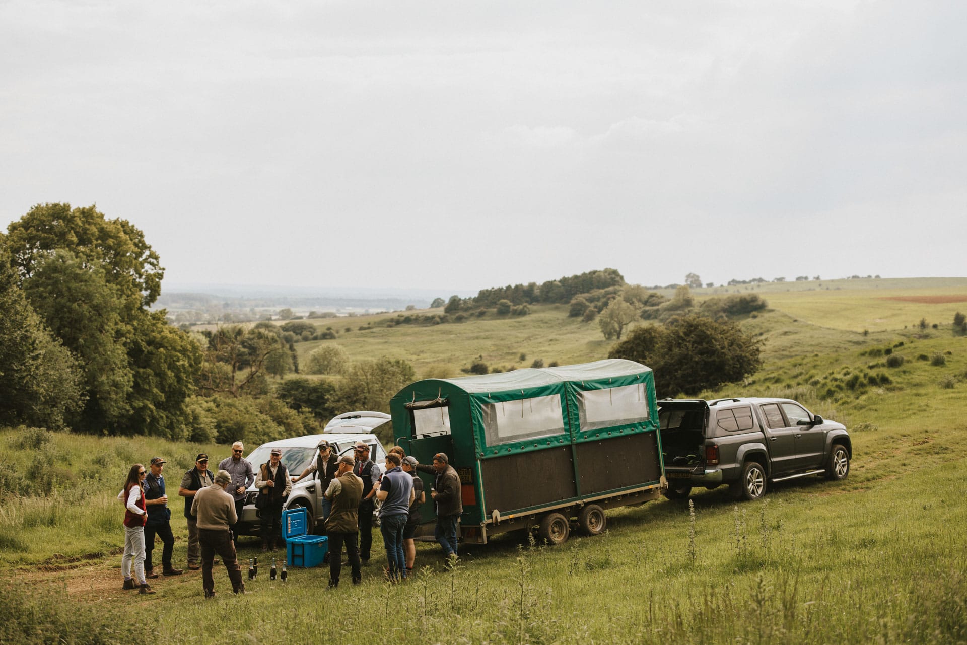 Group of people stood around the shooting trailer on the Otby land
